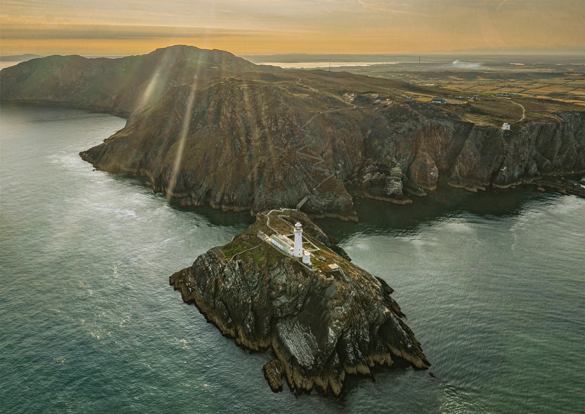 Bright and early over South Stack looking back towards Holy Island as the summer sun rises over Anglesey

18th July 2022